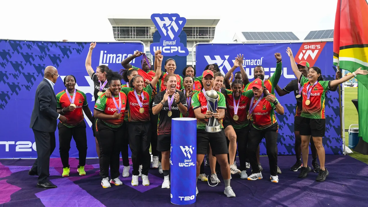 Guyana Amazon Warriors players celebrate winning the Limacol WCPL final against Trinbago Knight Riders at Kensington Oval