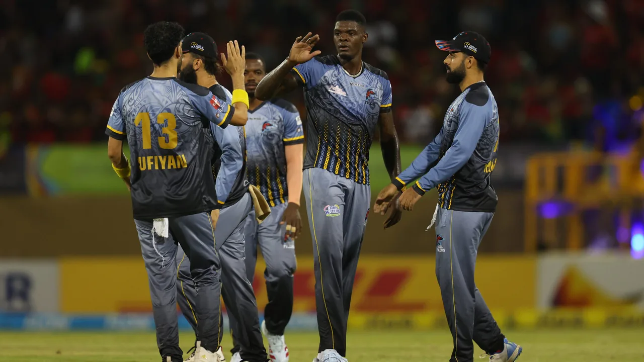 Alzarri Joseph and Shadab Khan celebrate as Antigua & Barbuda Falcons beat Guyana Amazon Warriors at Providence Stadium