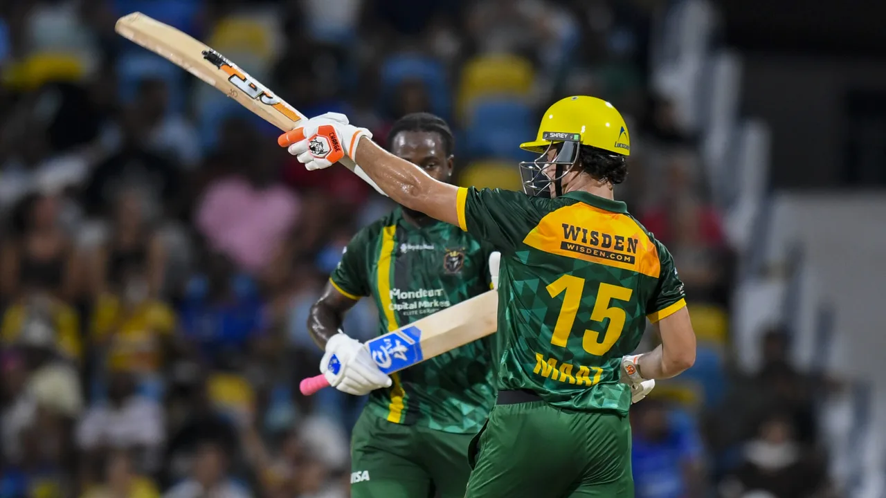 Maaz Sadaqat celebrates his century for Jamaica Kingsmen against Barbados Tridents in the CPL 2026 Eliminator at Kensington Oval