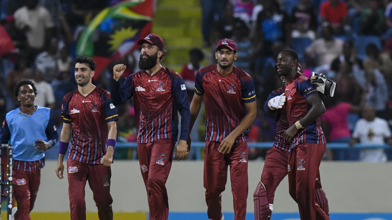 Moeen Ali and Antigua and Barbuda Falcons players celebrate their victory over Barbados Tridents