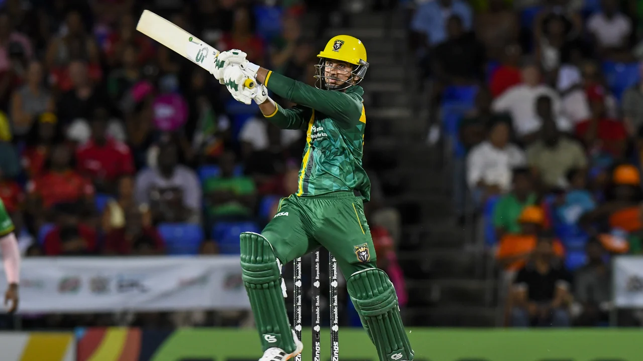 Saim Ayub celebrates his century for Jamaica Kingsmen against St Kitts and Nevis Patriots