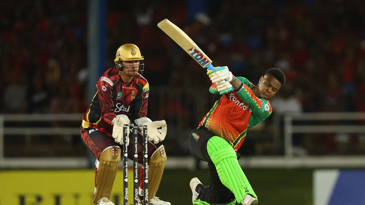 Shimron Hetmyer celebrates his century for Guyana Amazon Warriors against Trinbago Knight Riders