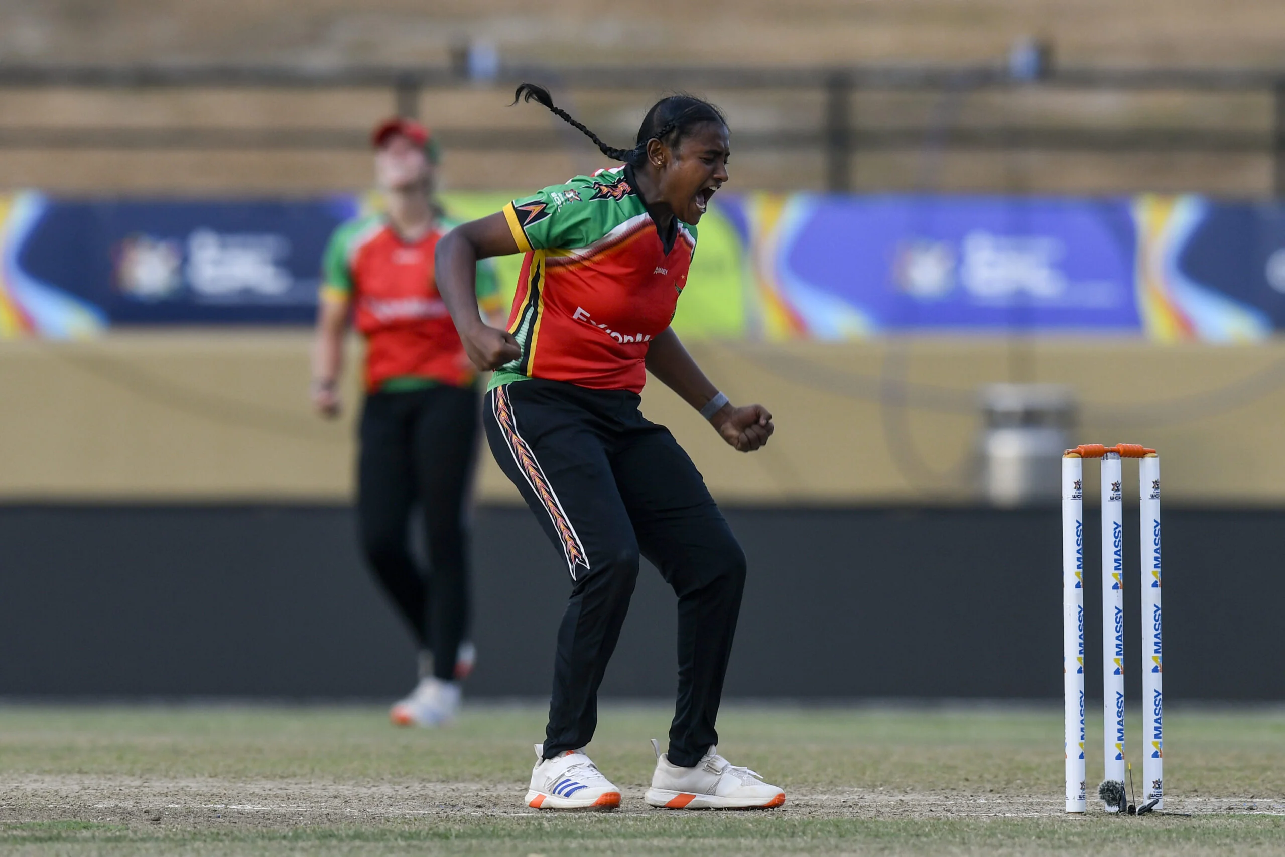 Women's Caribbean Premier League bowler celebrates taking a wicket